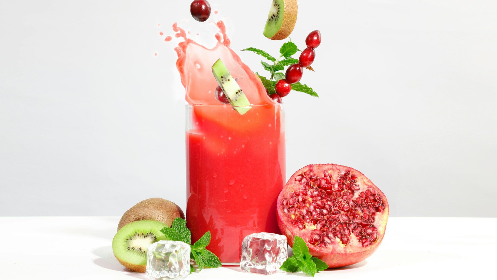 strawberry juice in clear drinking glass