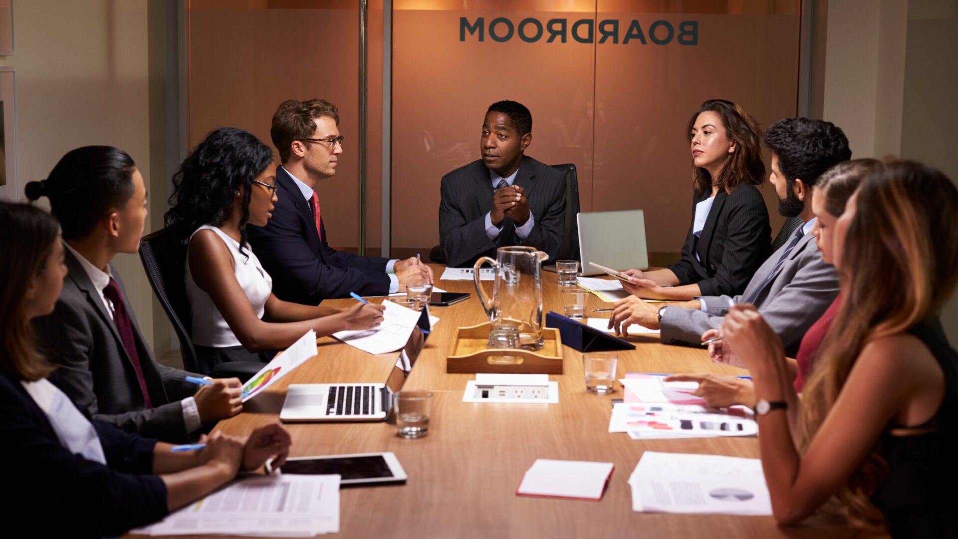 CEOs in Boardroom Talking Tariffs