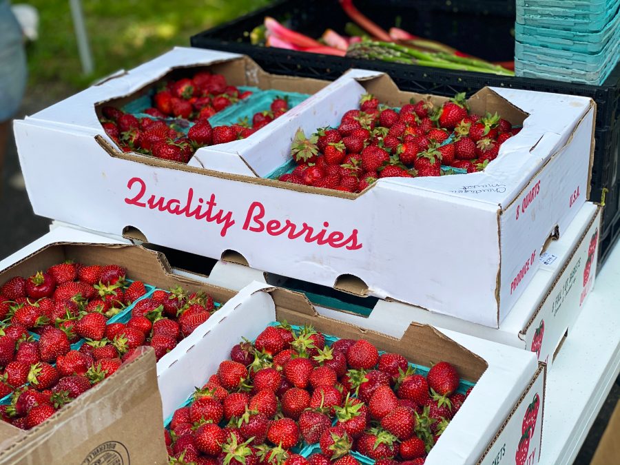 strawberries in white cardboard box