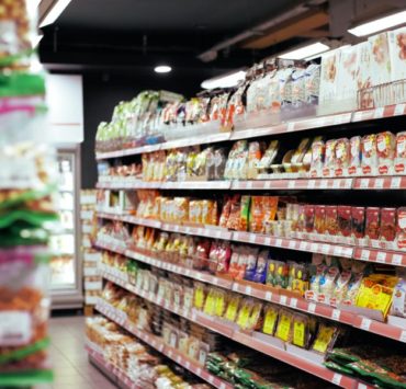 white and red labeled pack on shelf
