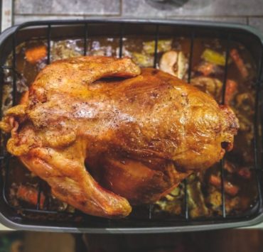 roasted chicken on top of grill