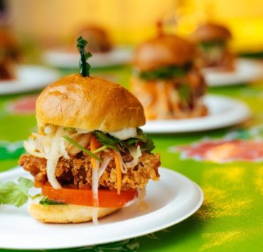 burger on white and green plate