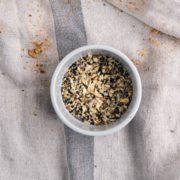 white ceramic bowl with brown seeds