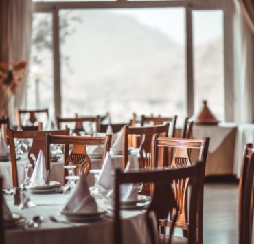 brown wooden dining set inside room