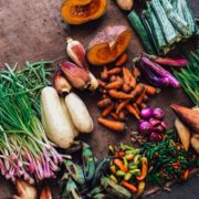 assorted vegetables on brown textile