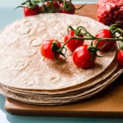 red cherries on white round cake