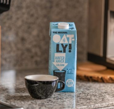 blue and white carton box on gray marble table