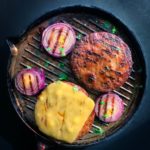 cooked meat on black round plate