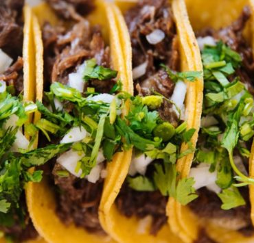 green vegetable on brown soil