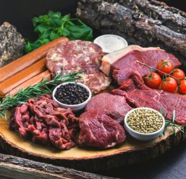 raw meat on white ceramic plate