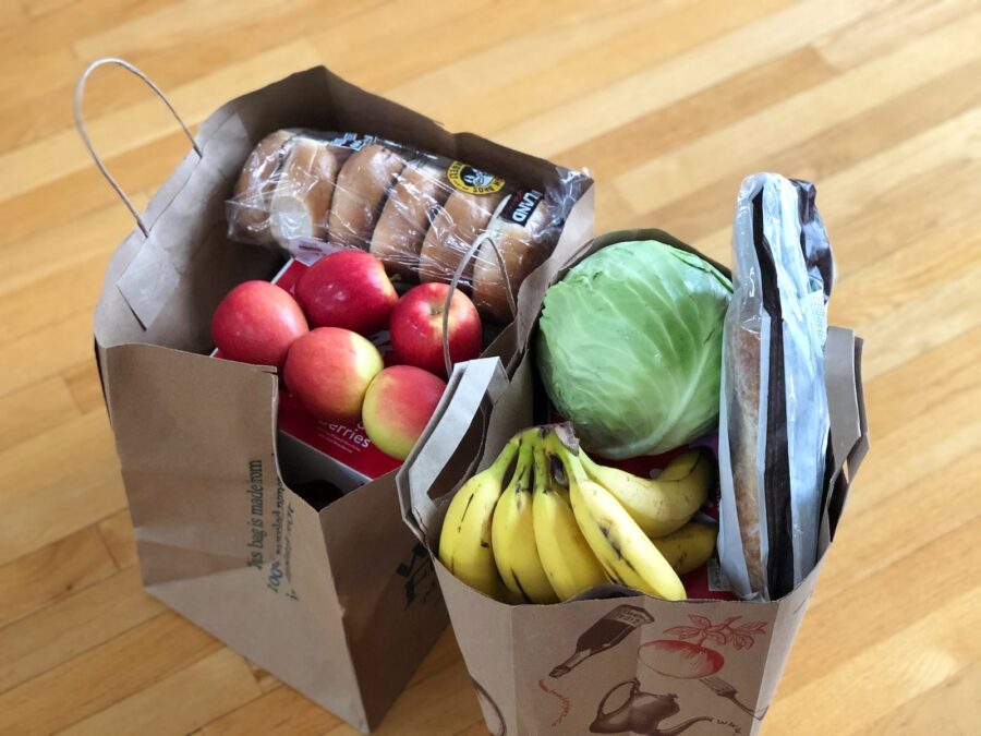 grocery delivery, apples and bananas in brown cardboard box