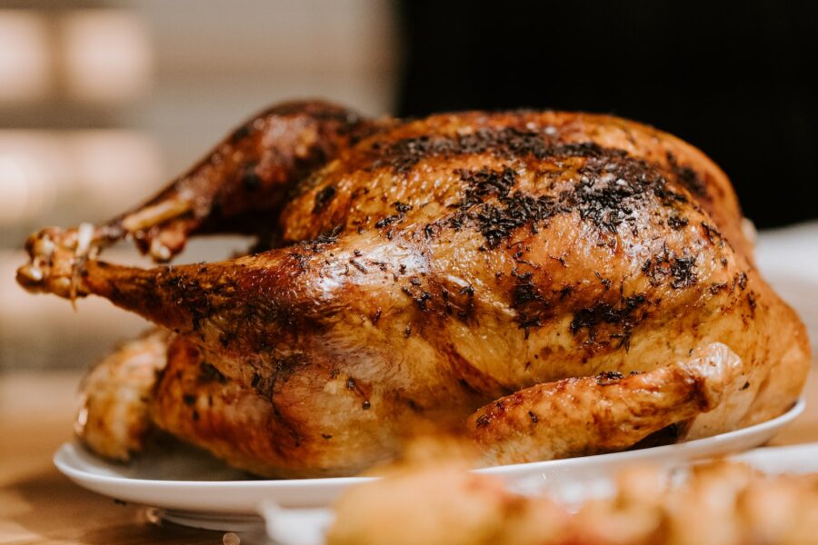 thanksgiving turkeys, turkey prices, roasted chicken on white ceramic plate