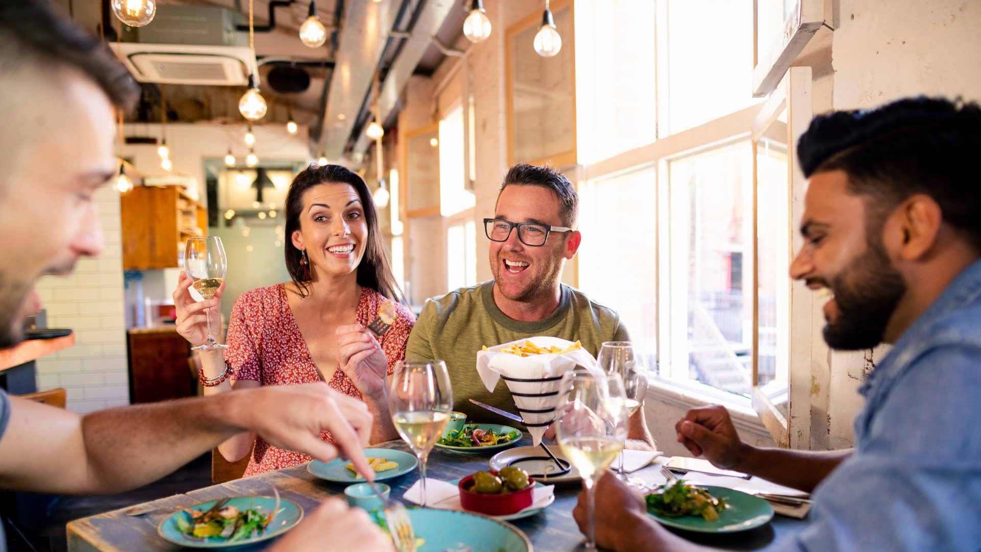Restaurant diners eating salad