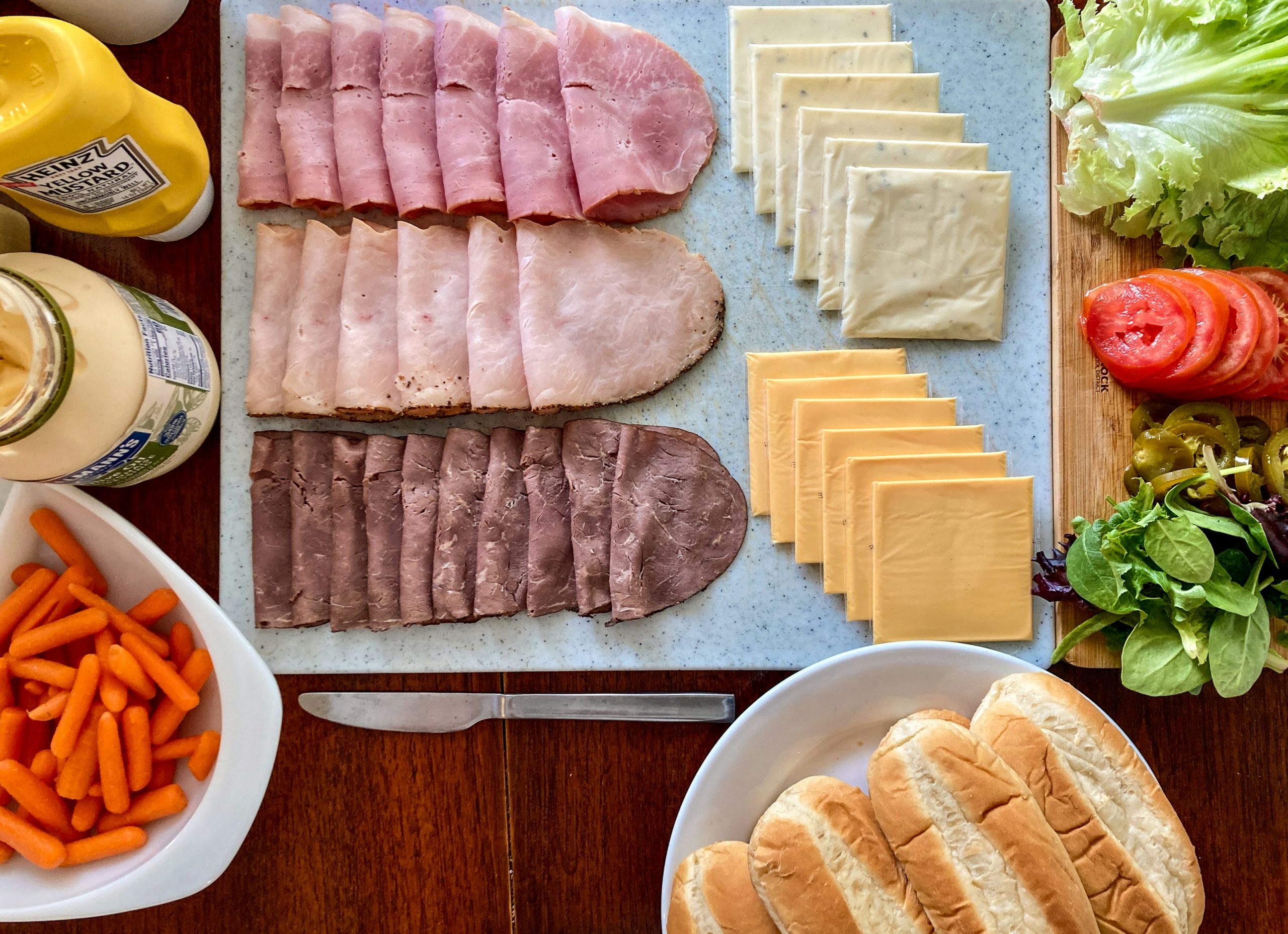 a variety of food is laid out on a table