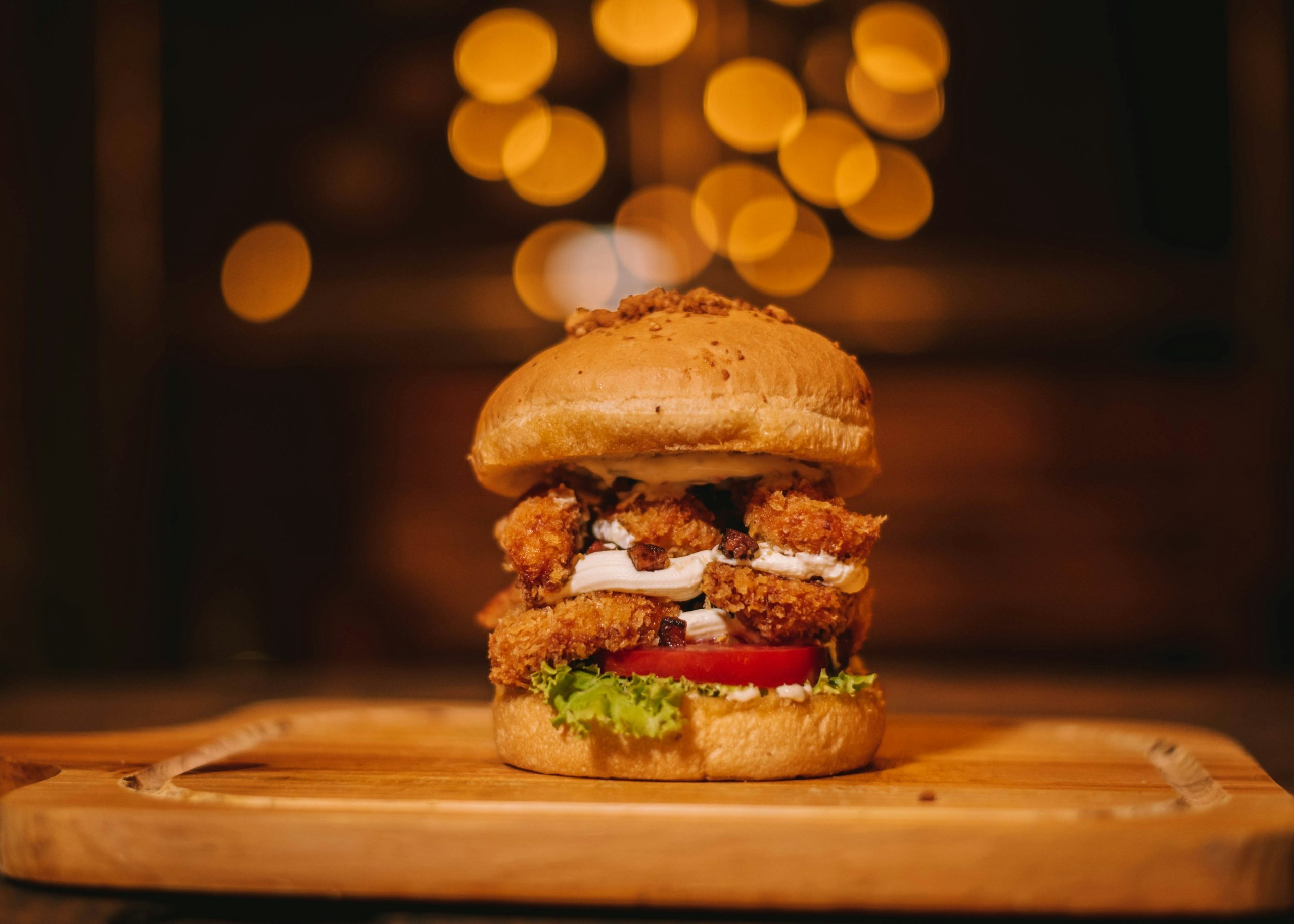 burger on brown wooden table